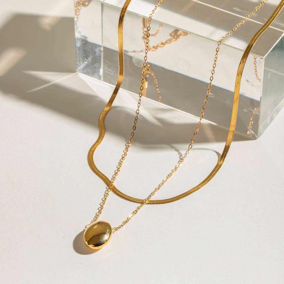 
                  
                    Bean and Herringbone Necklace Stack
                  
                