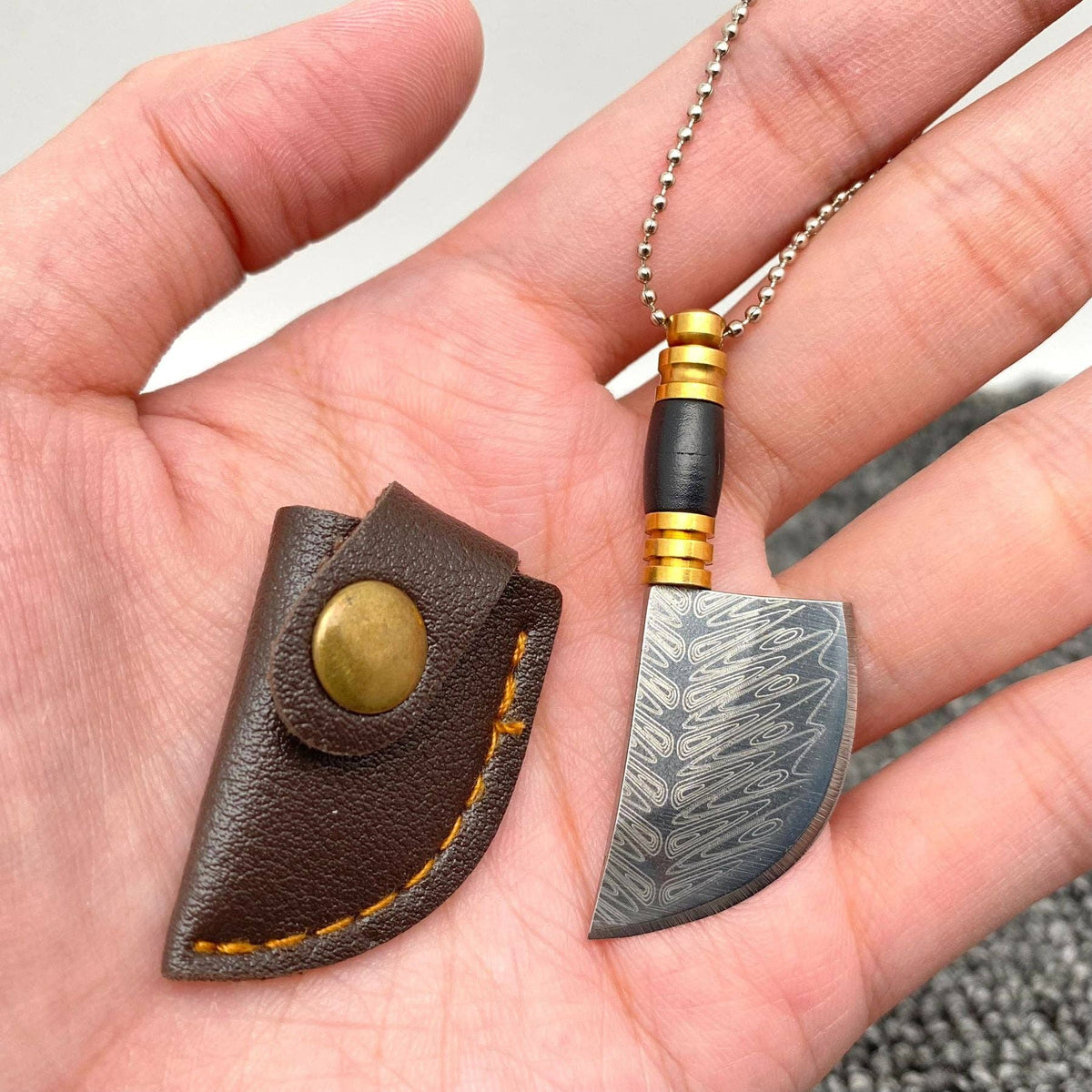 
                  
                    Most Mini Damascus Pocket Knife With Protective Sheath
                  
                