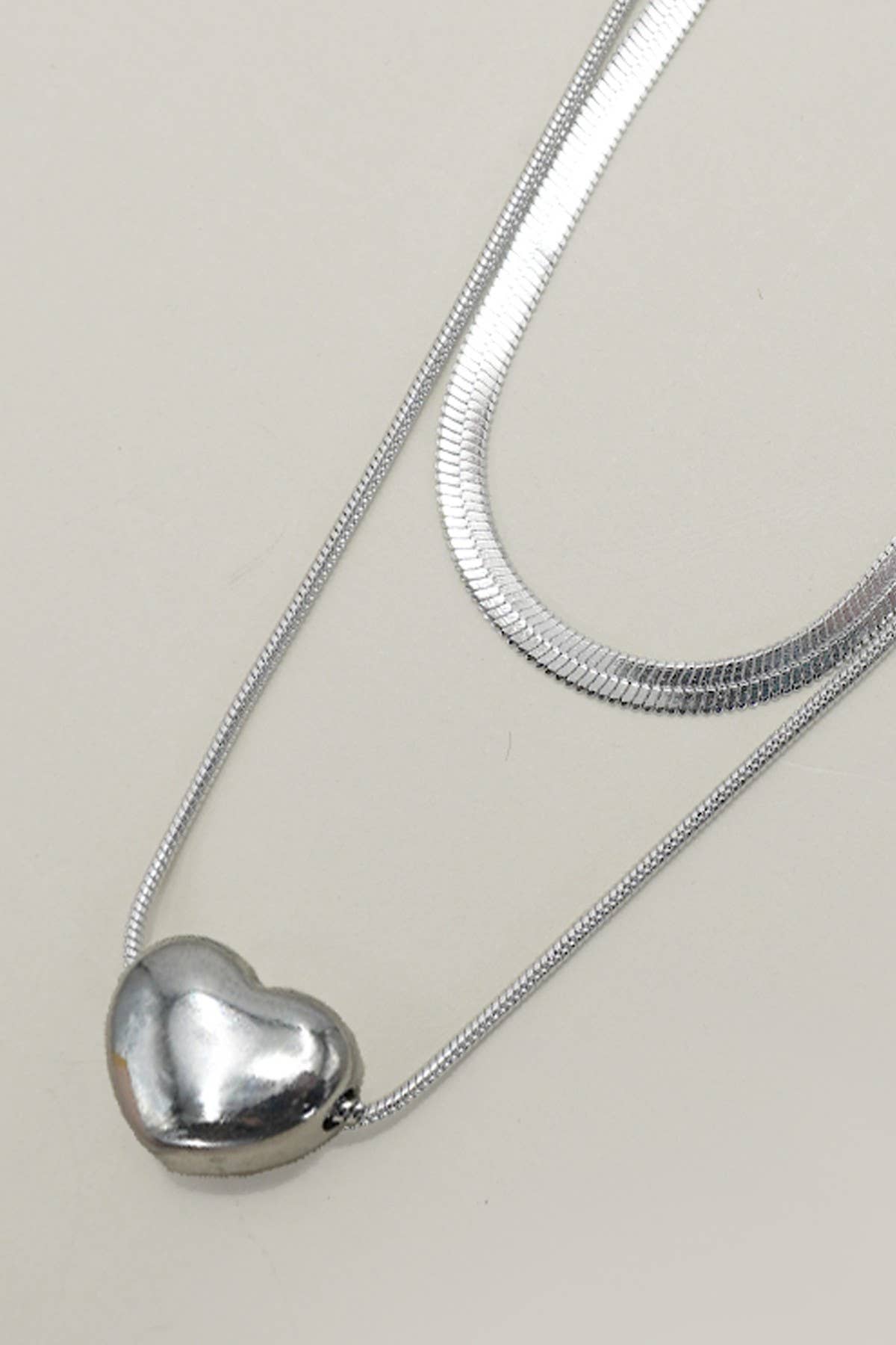 
                  
                    Silver Heart Necklace Stack
                  
                