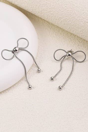 Silver Bow Movement Earrings