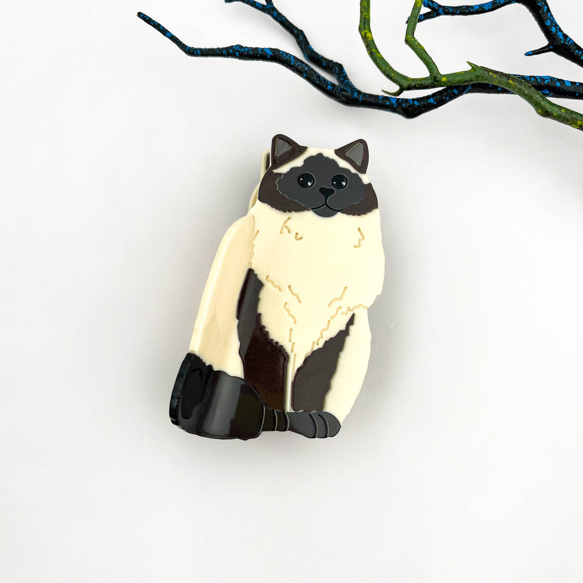
                  
                    Sitting Cat Hair Claw
                  
                