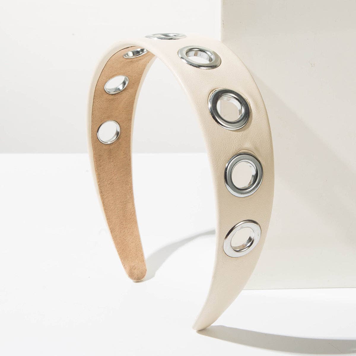 
                  
                    90s Metal Eyelets Headband
                  
                