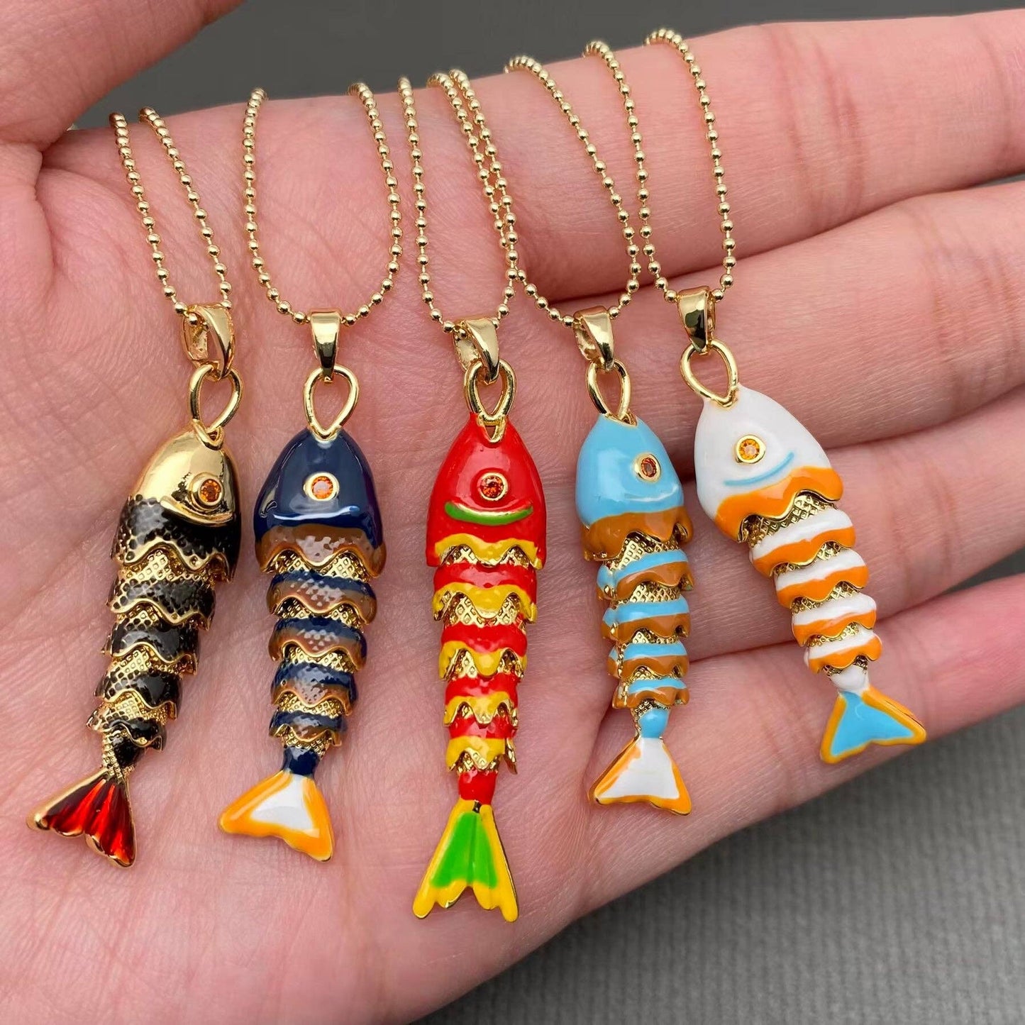
                  
                    Enamel Wiggle Fish Necklace
                  
                