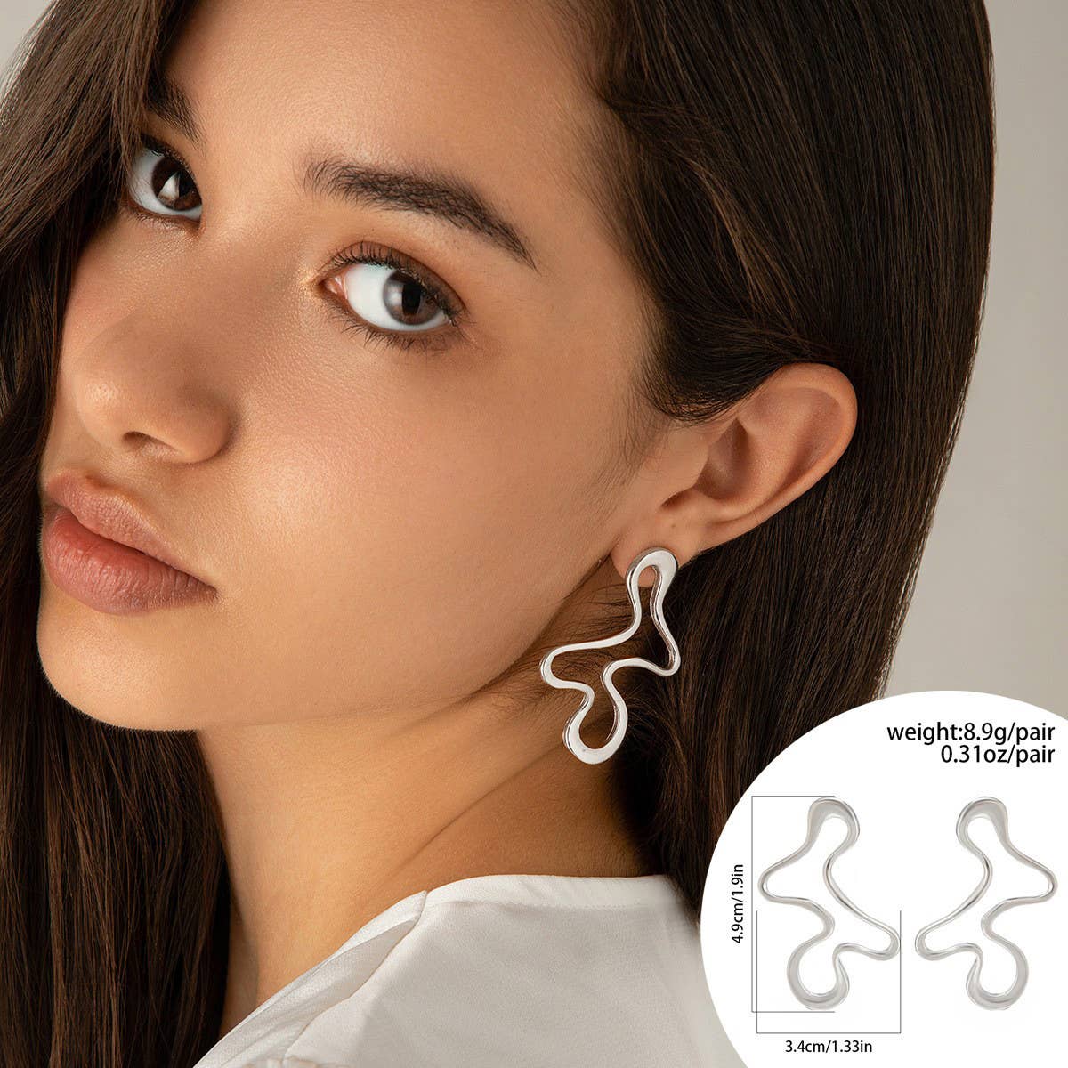 
                  
                    Irregular Squiggle Teardrop Earrings
                  
                