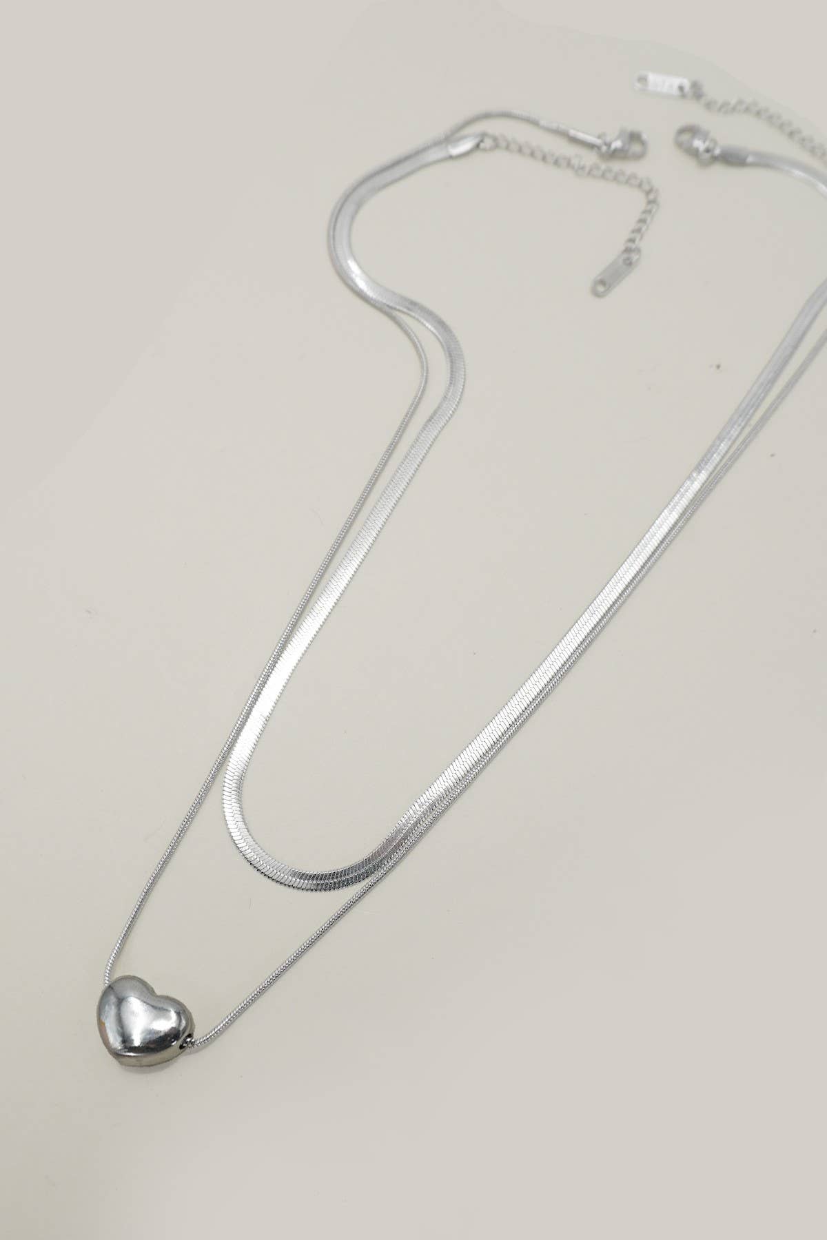 
                  
                    Silver Heart Necklace Stack
                  
                