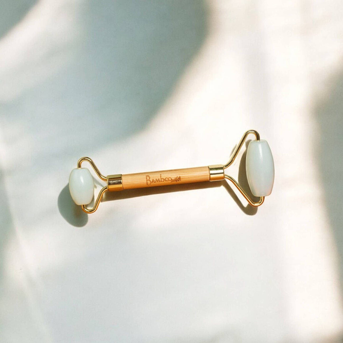 
                  
                    Stone + Bamboo Facial Massage Roller
                  
                