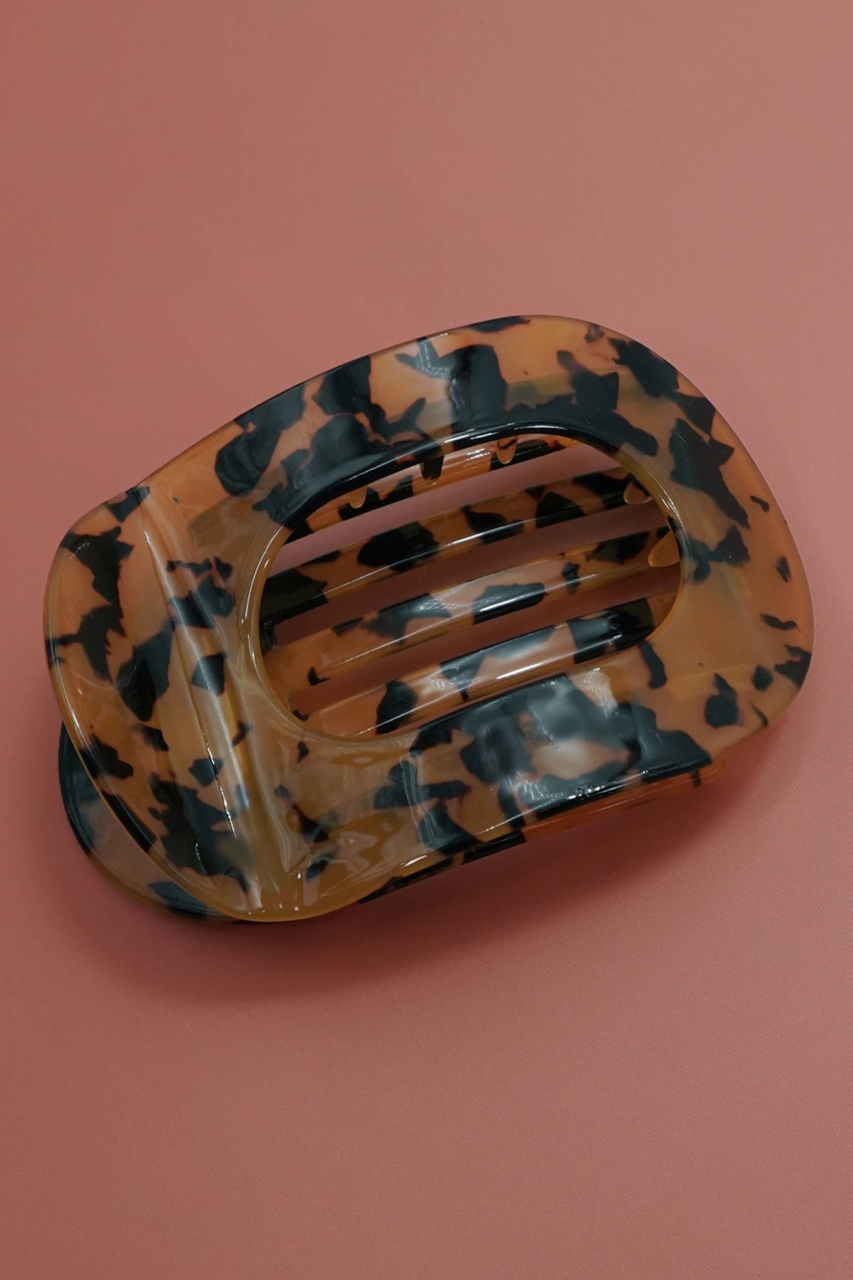 
                  
                    Glossy Oval Flat Hair Claw
                  
                