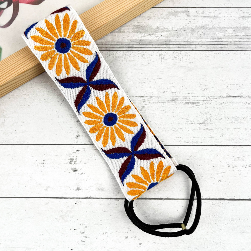 
                  
                    Embroidered Coneflower Knotted Headband
                  
                