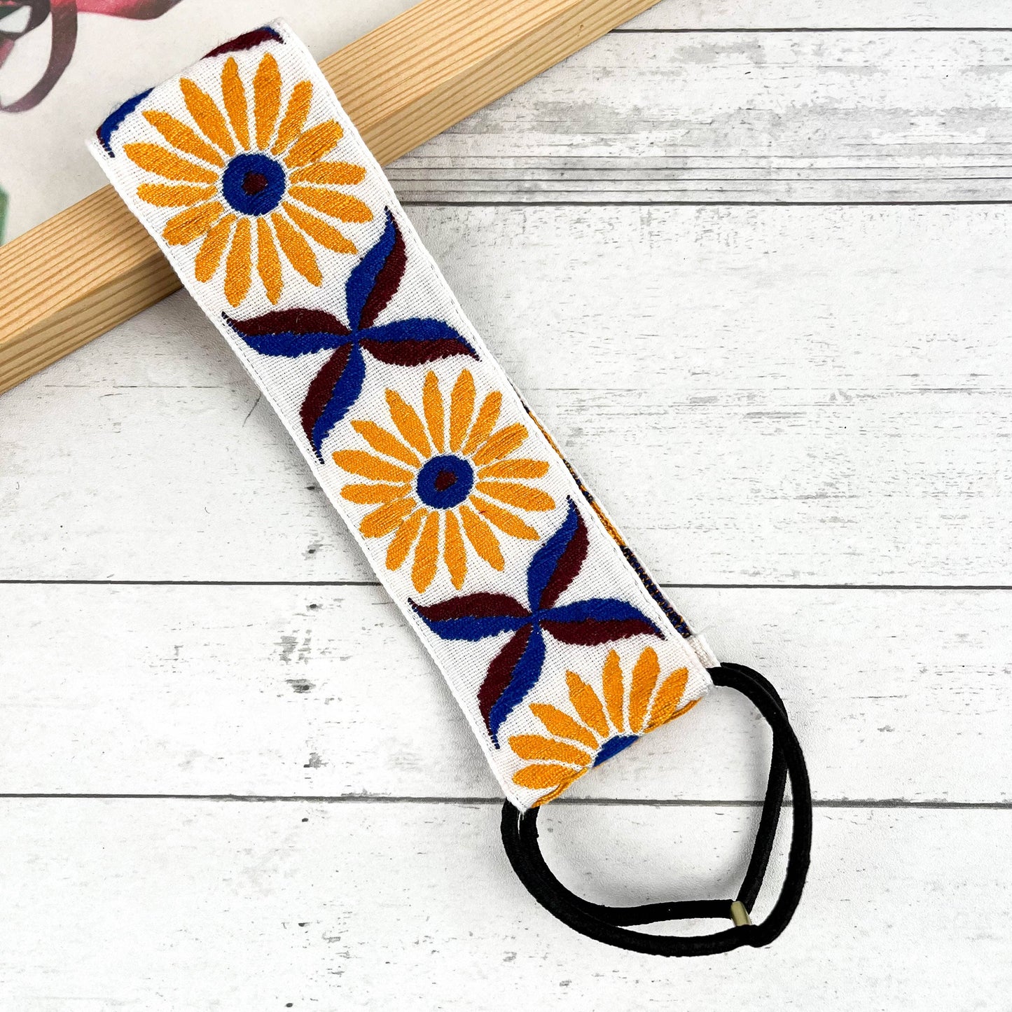 
                  
                    Embroidered Coneflower Knotted Headband
                  
                