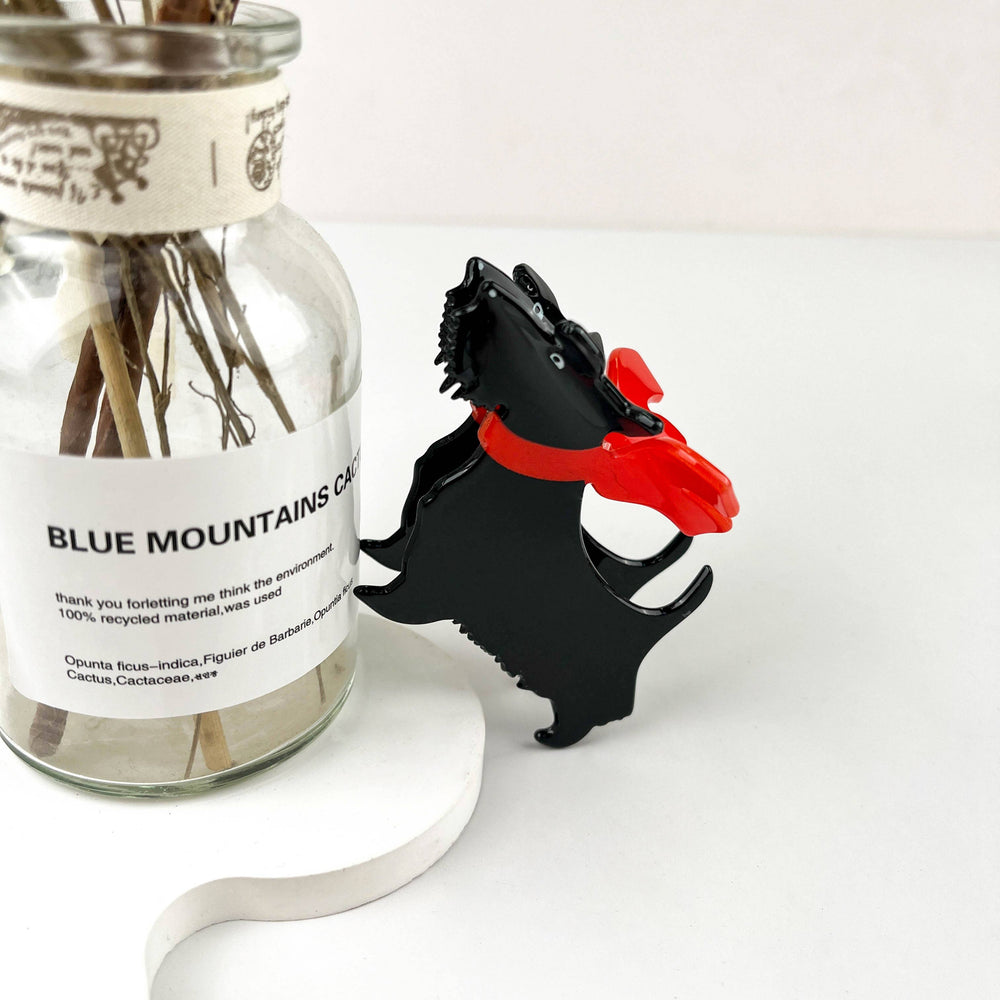 
                  
                    Scarf Wearing Scottie Hair Claw
                  
                