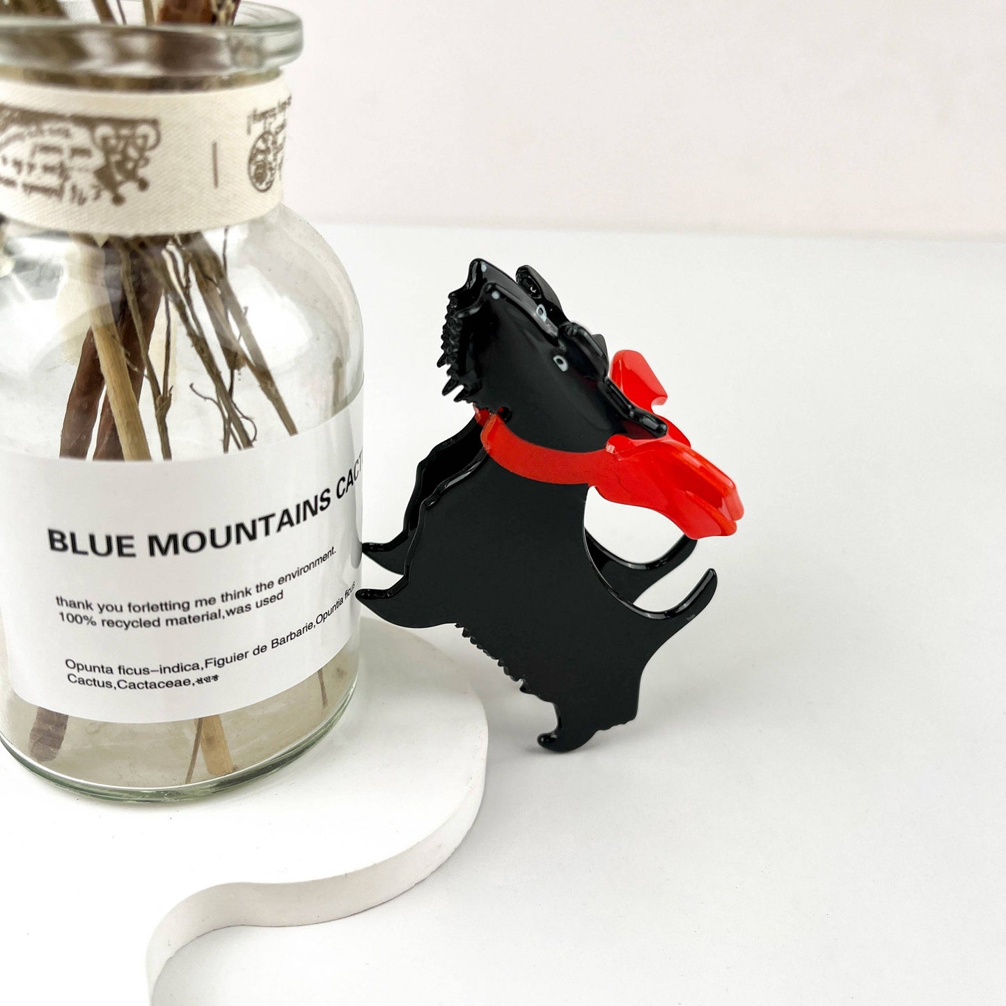 
                  
                    Scarf Wearing Scottie Hair Claw
                  
                