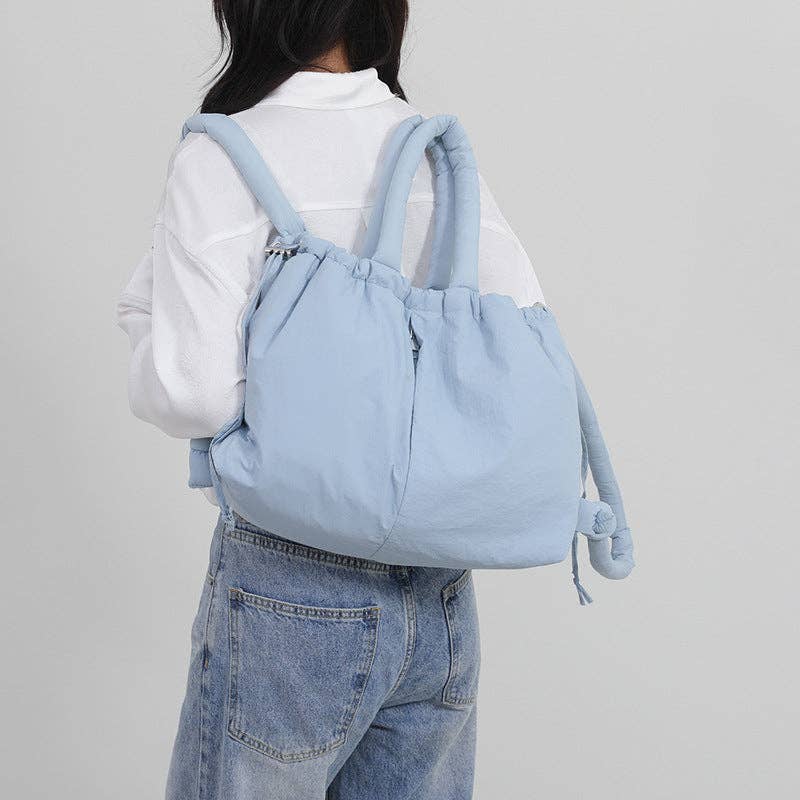 
                  
                    Convertible Large Capacity Nylon Puffer Backpack/Tote
                  
                