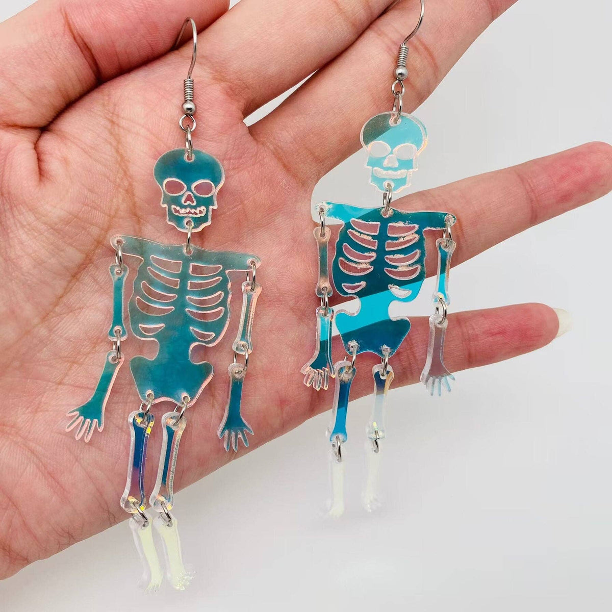 
                  
                    Iridescent Acrylic Skeleton Earrings
                  
                