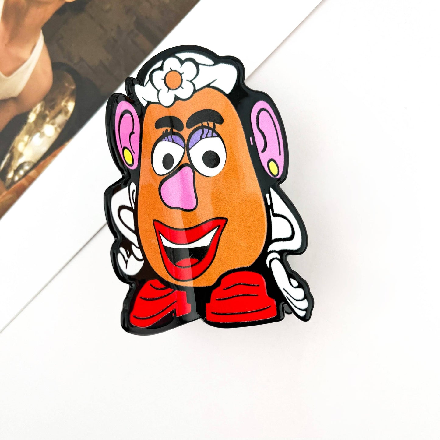 
                  
                    Potato Head Hair Claw
                  
                