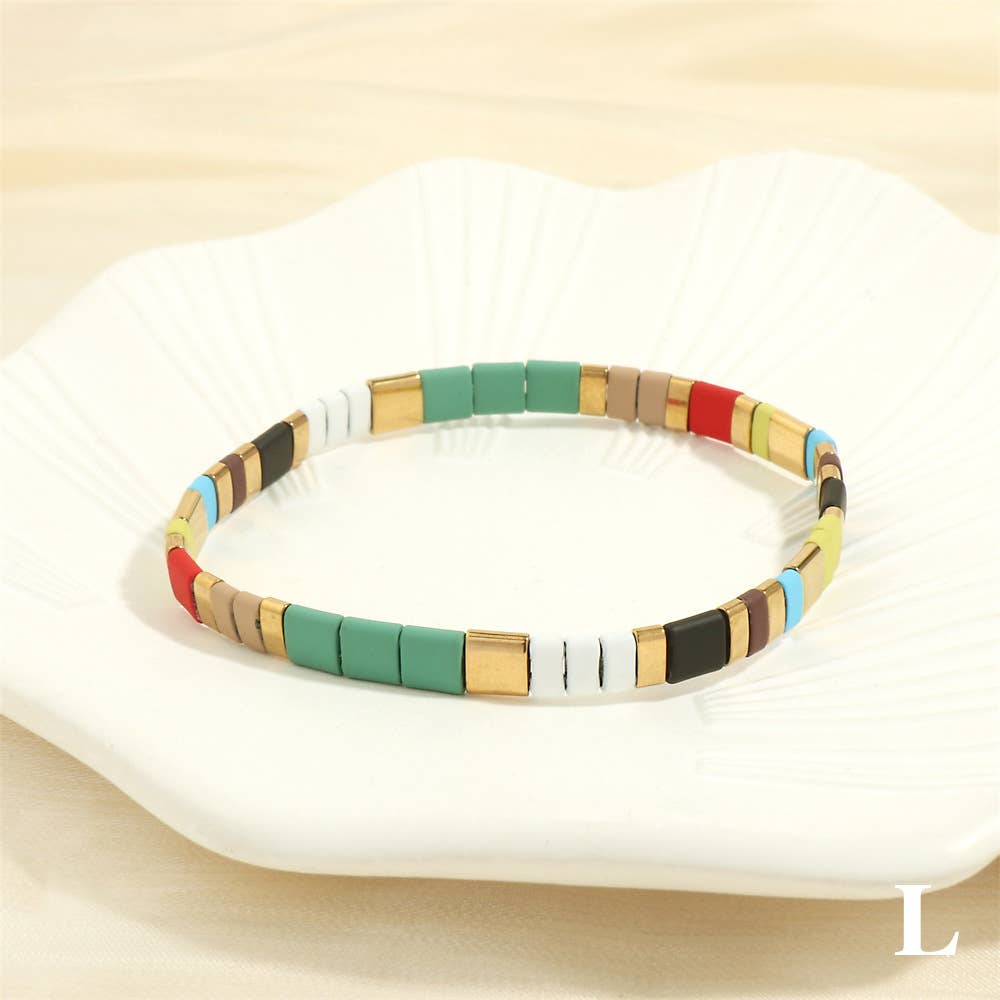 
                  
                    Glass TILA + Hematite Beaded Elastic Bracelets (Collection B)
                  
                