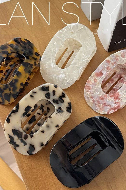 
                  
                    Glossy Oval Flat Hair Claw
                  
                