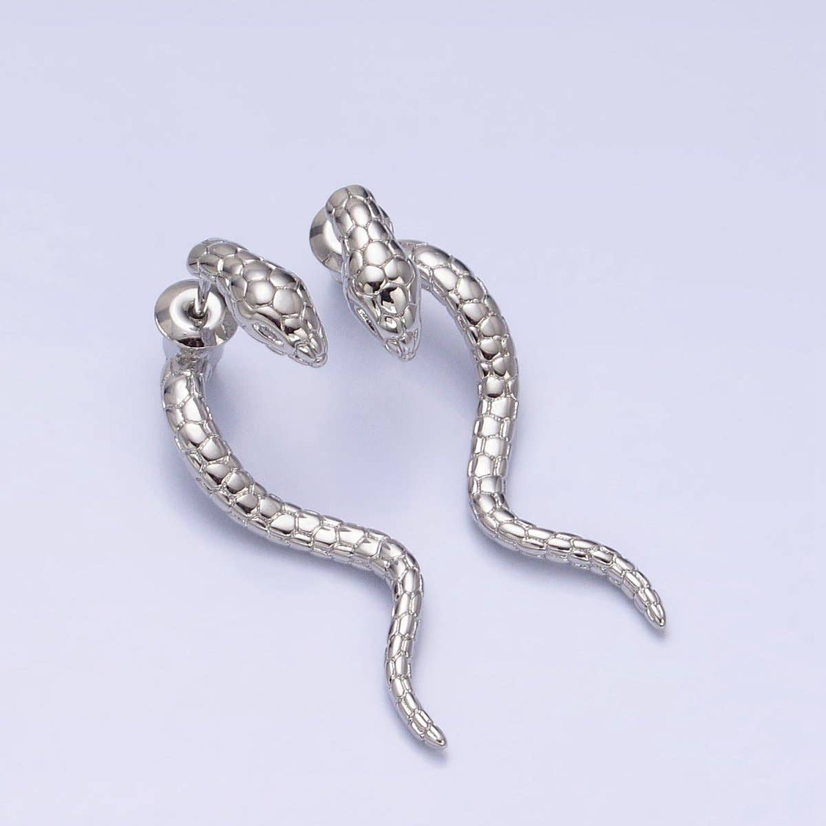 
                  
                    Snake Jacket Earrings
                  
                