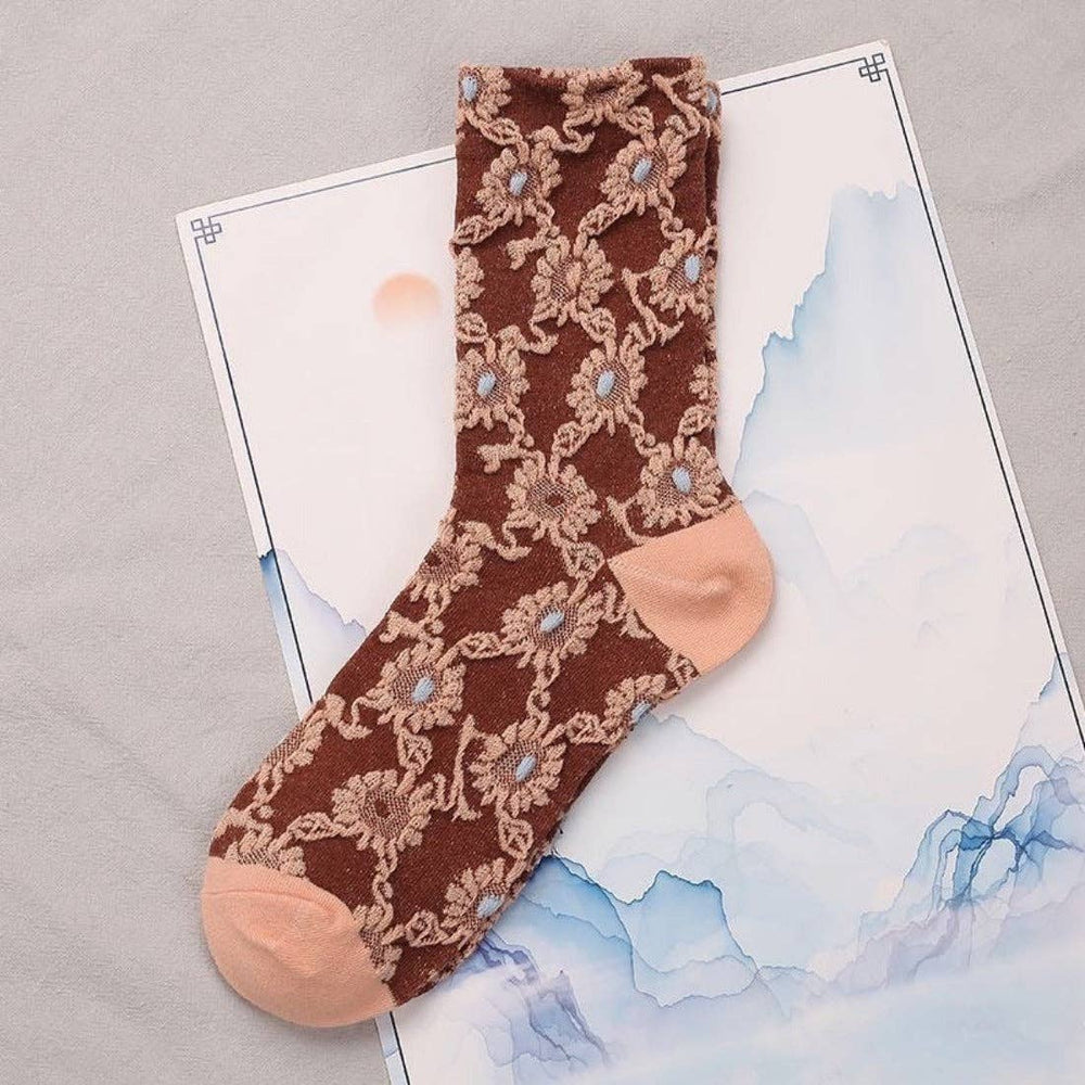 
                  
                    Embossed Women's Socks - Orange Florals
                  
                