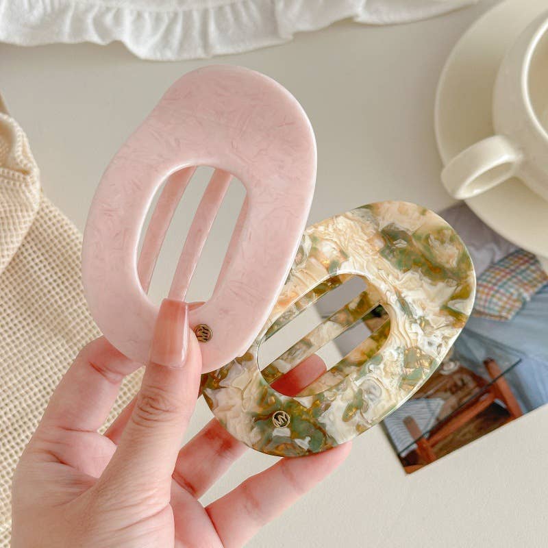 
                  
                    Marbled Oval Flat Hair Claw
                  
                