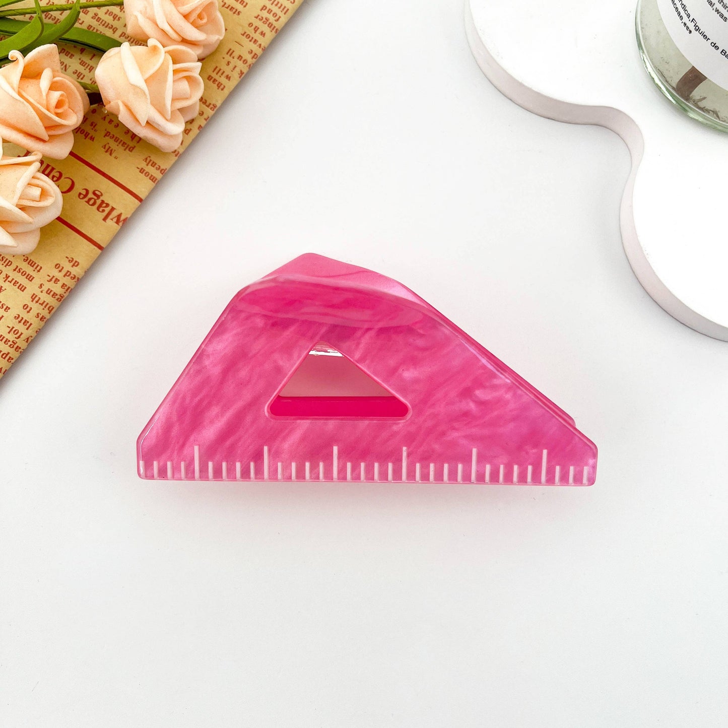 
                  
                    Triangle Ruler Hair Claw
                  
                