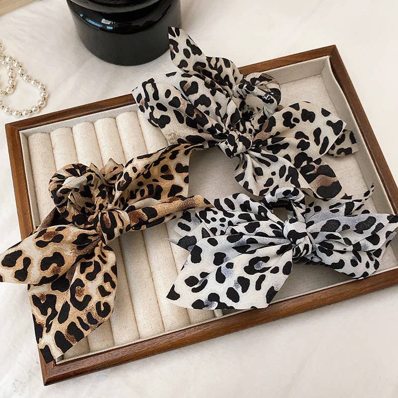 
                  
                    Animal Print Fabric Hair Claw
                  
                