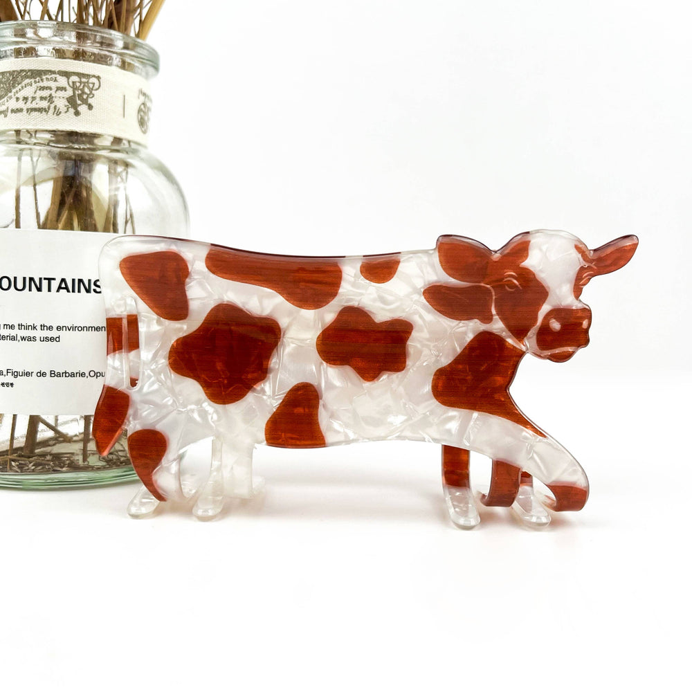 Brown and White Cow Claw