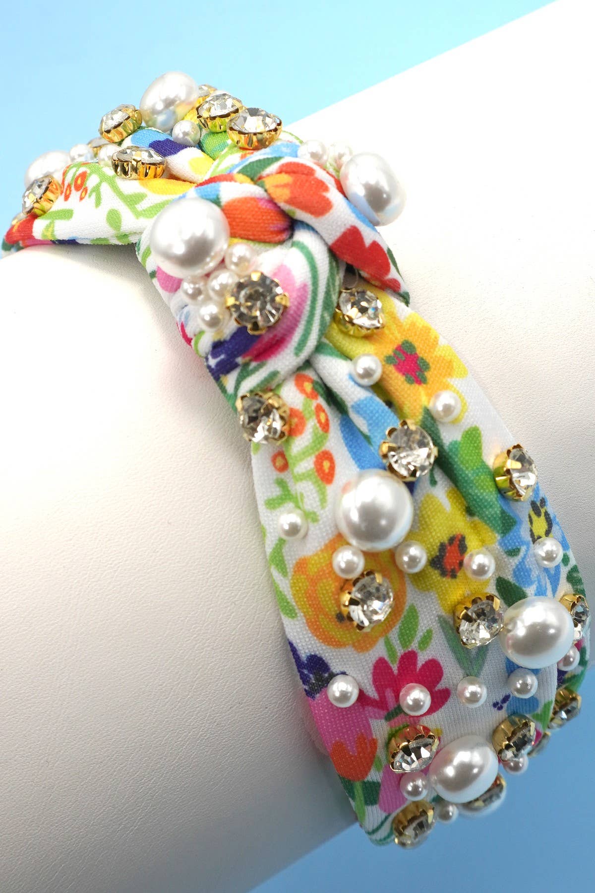 
                  
                    Pearl Embellished Top Knot Floral Headband
                  
                