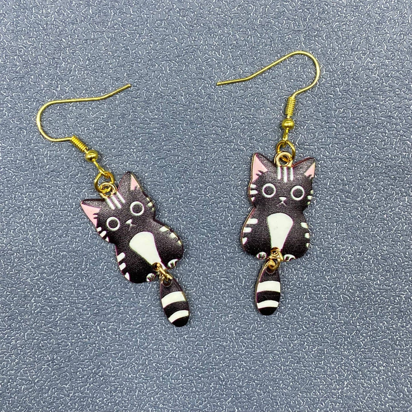 
                  
                    Swinging Tail Cat Earrings
                  
                