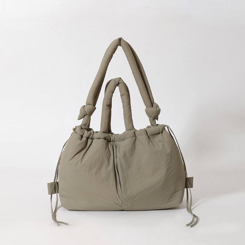
                  
                    Convertible Large Capacity Nylon Puffer Backpack/Tote
                  
                