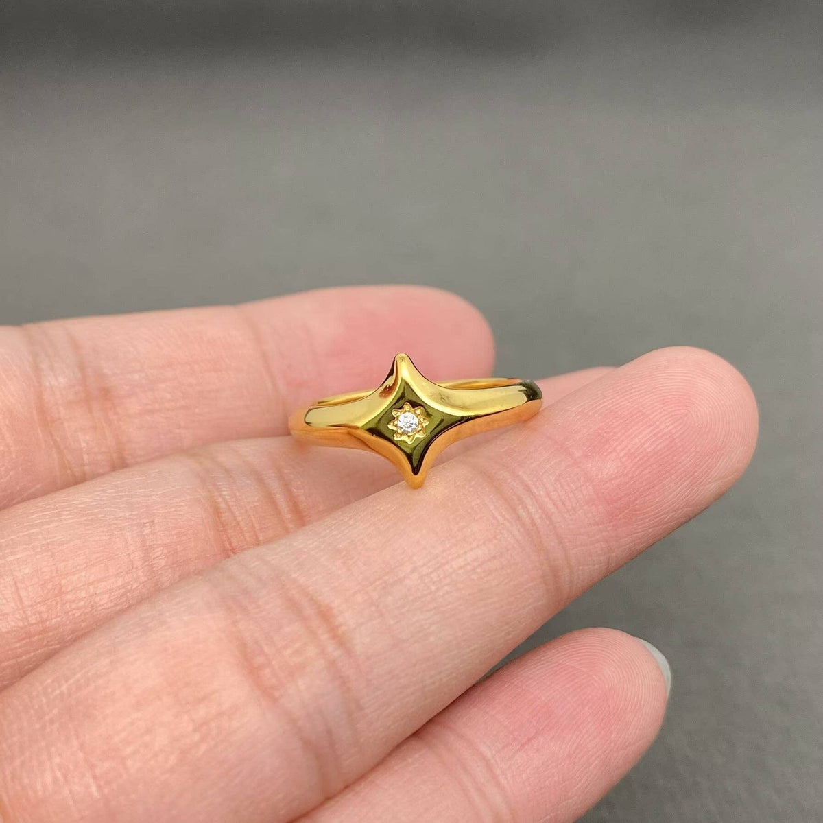 
                  
                    CZ Inlaid 4 Point Star Ring
                  
                