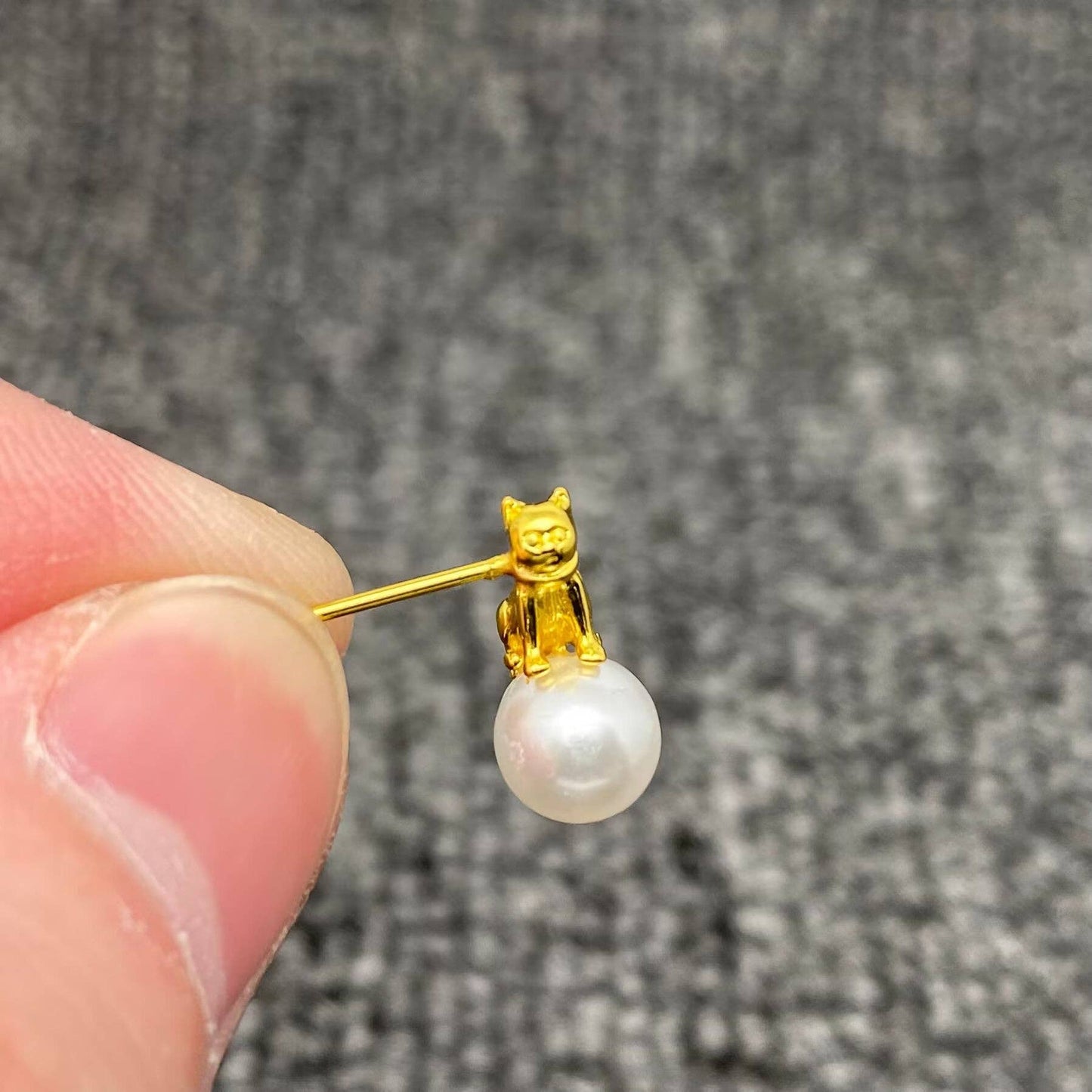 
                  
                    Asymmetric Cats Playing on Pearls Studs
                  
                