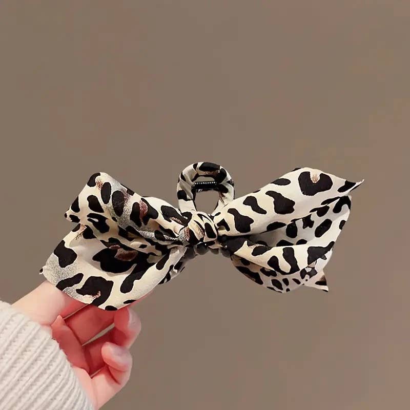 
                  
                    Animal Print Fabric Hair Claw
                  
                