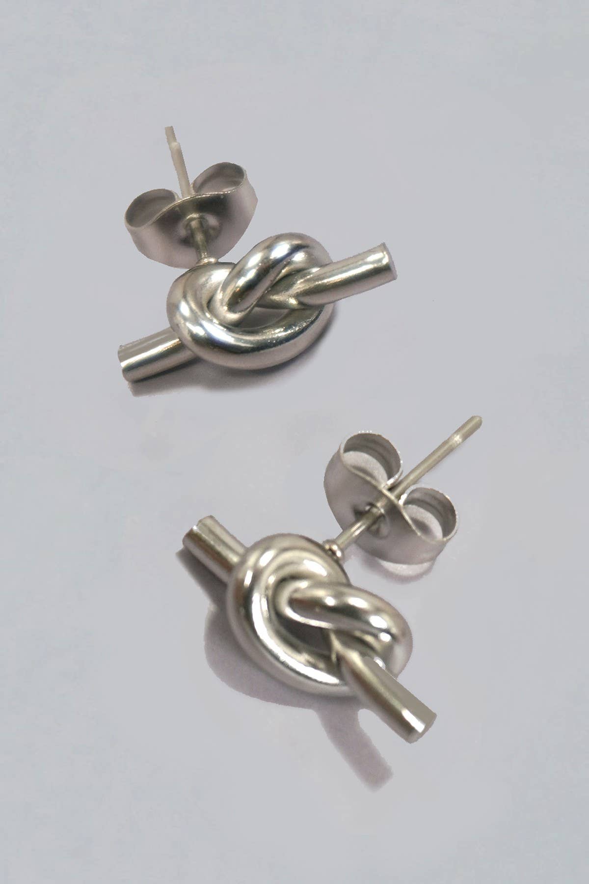 
                  
                    Knot Studs
                  
                