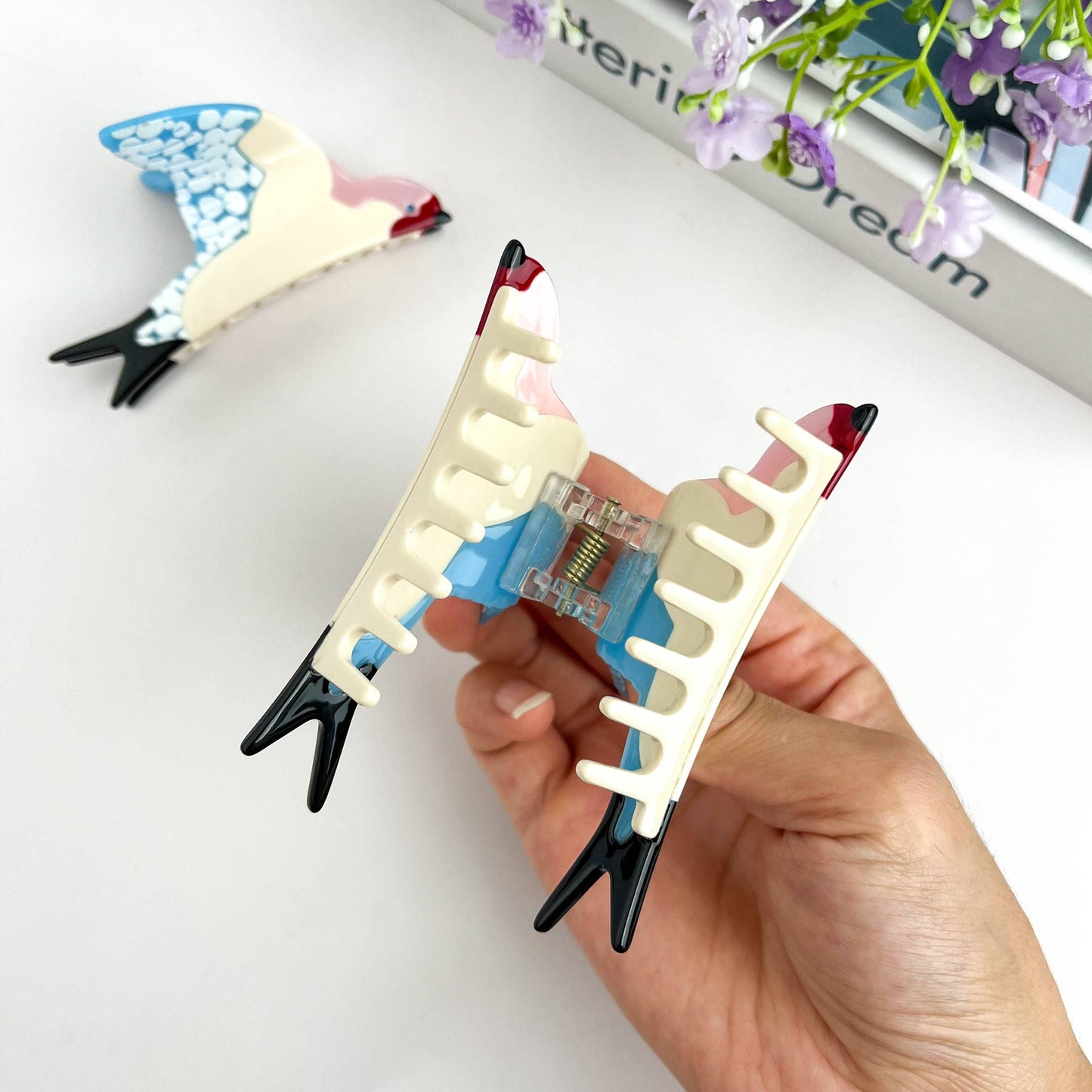 
                  
                    Blue Swallow Hair Claw
                  
                