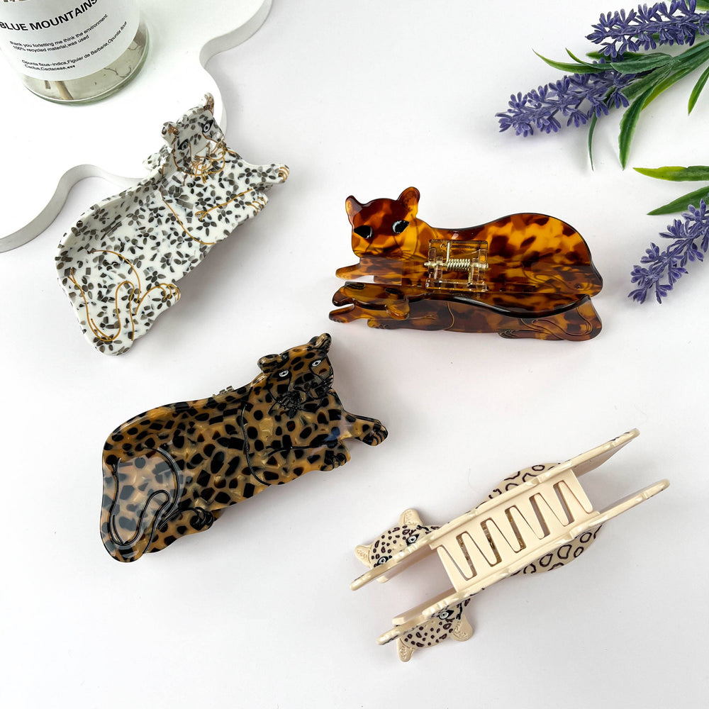 
                  
                    Lounging Leopards Hair Claw
                  
                