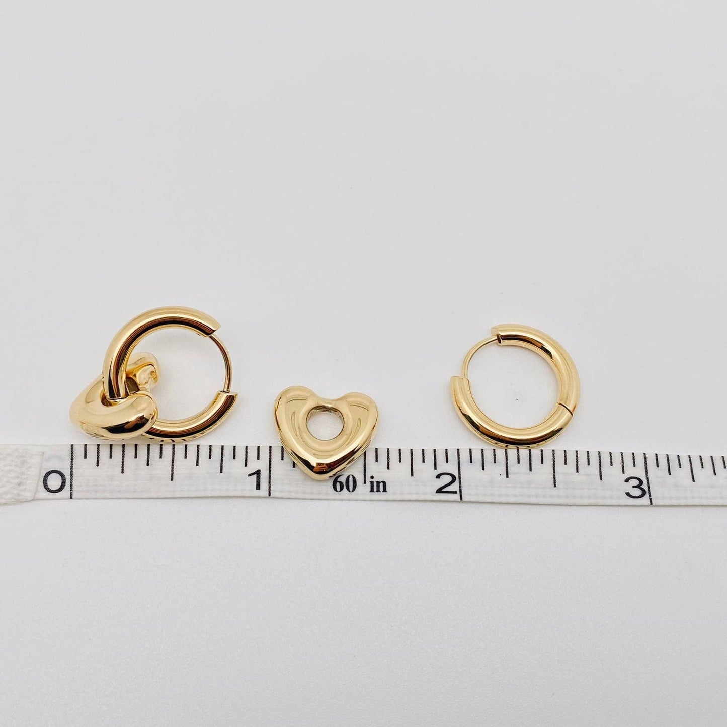 
                  
                    Heart Charm Huggies
                  
                