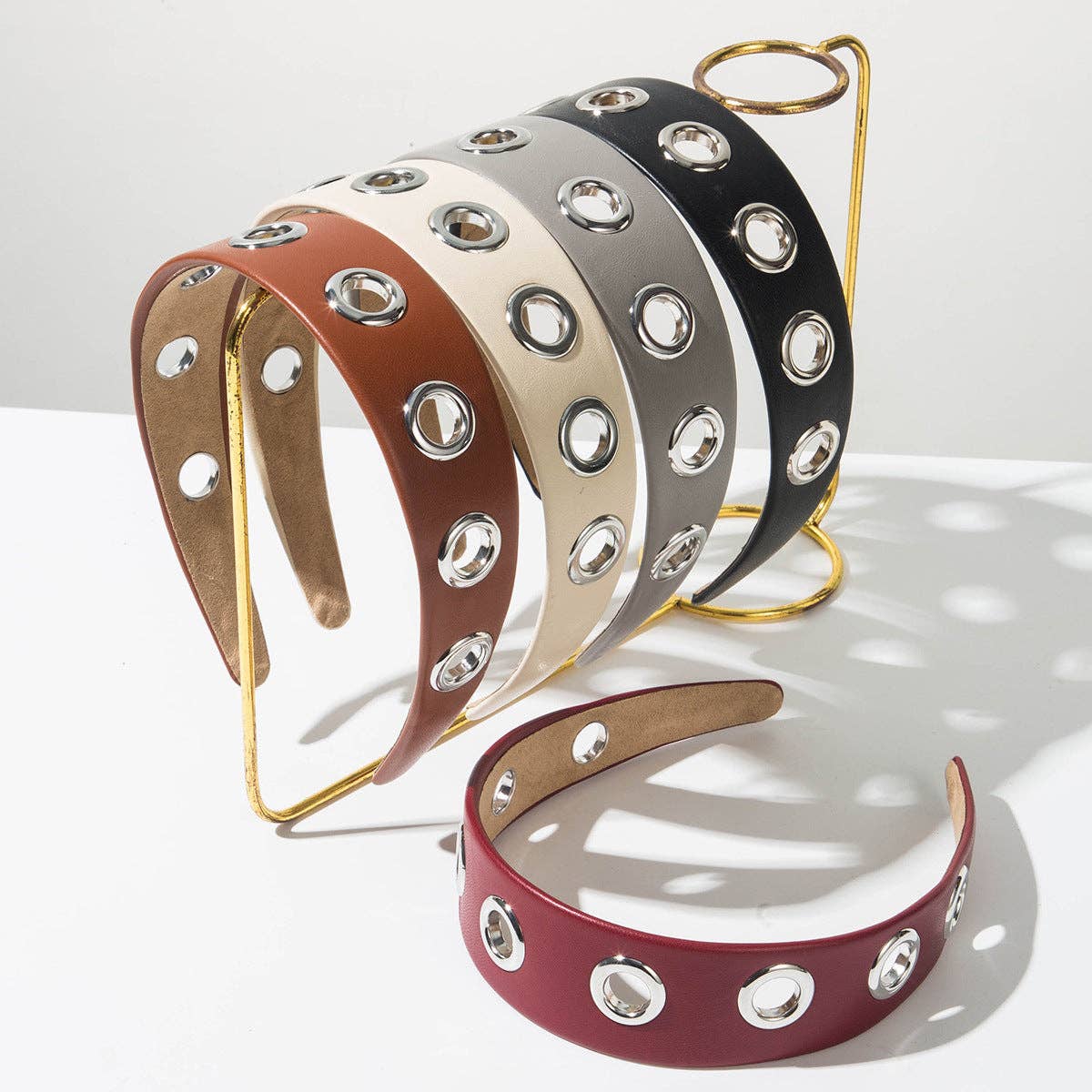 
                  
                    90s Metal Eyelets Headband
                  
                