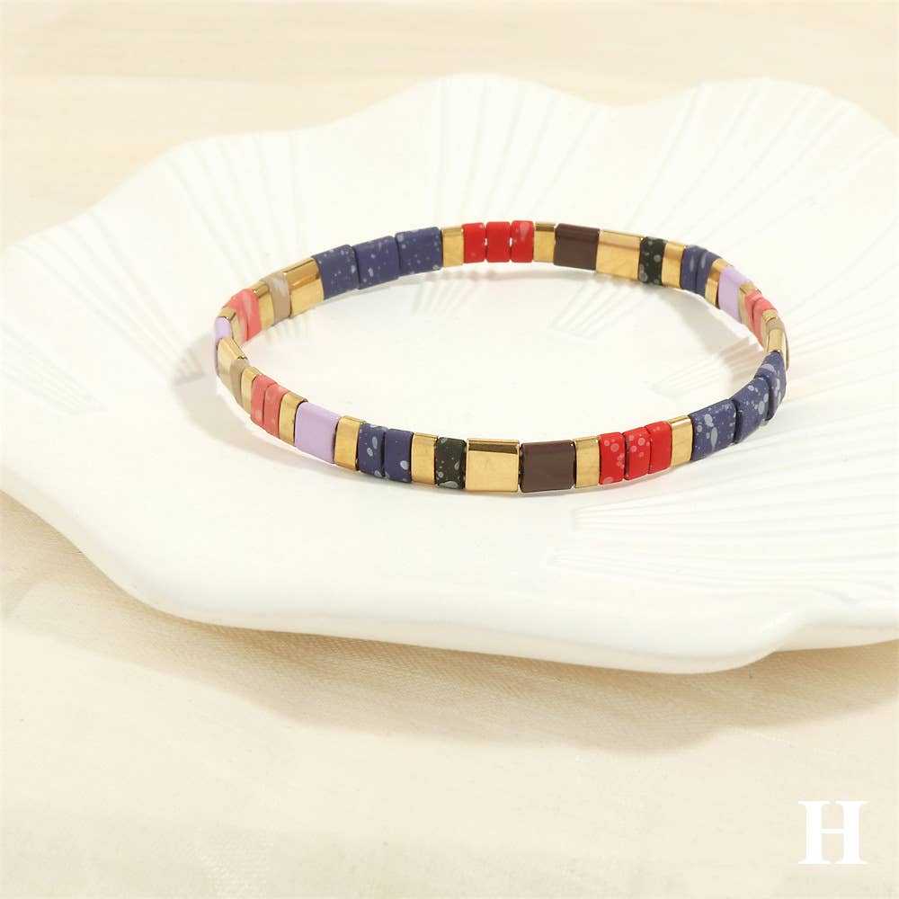 
                  
                    Glass TILA + Hematite Beaded Elastic Bracelets (Collection B)
                  
                