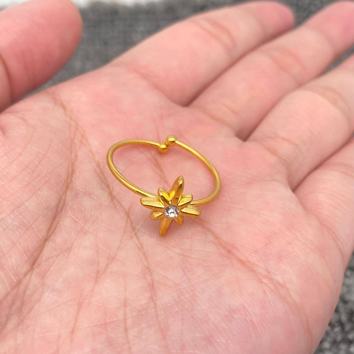 
                  
                    North Star CZ Inlaid Adjustable Ring
                  
                