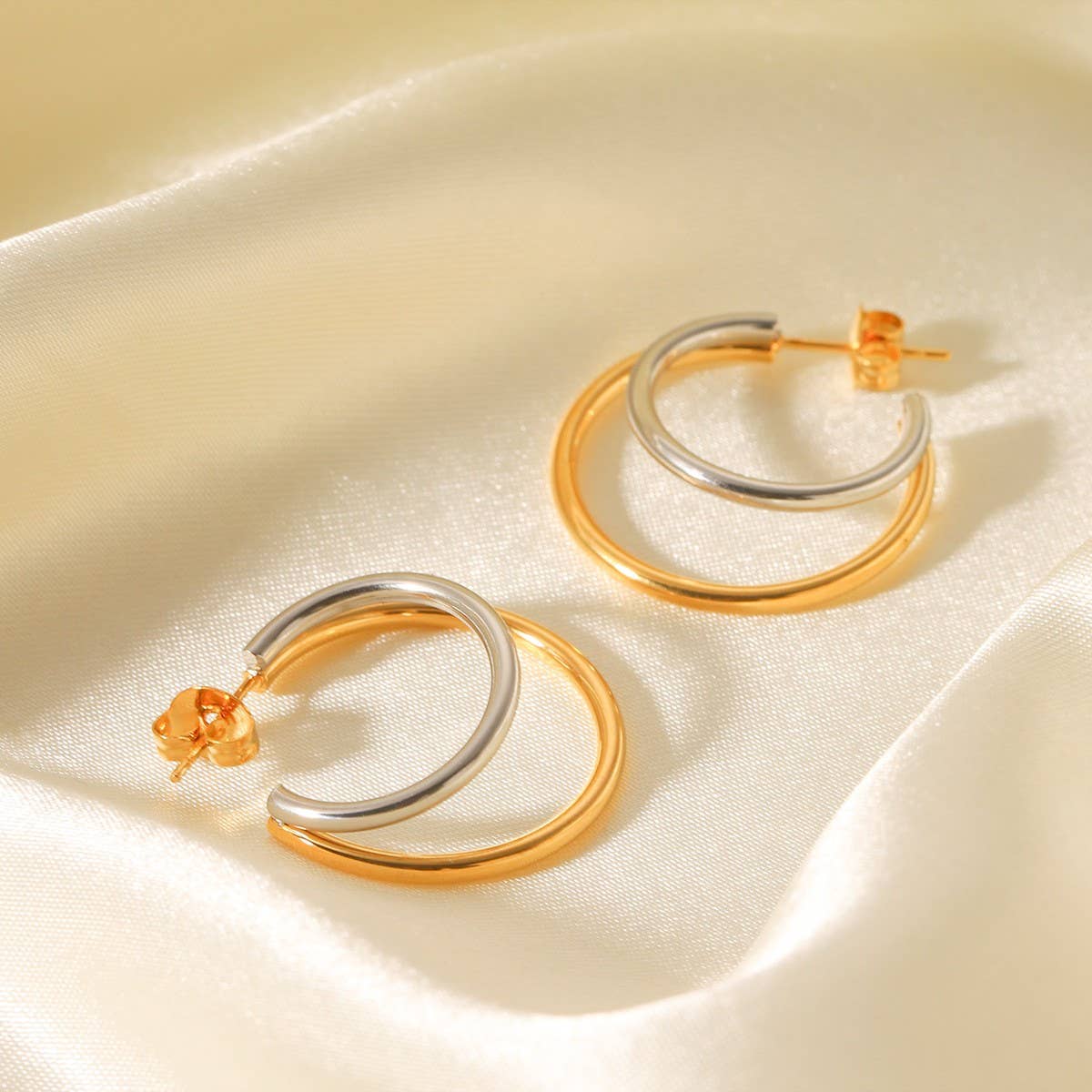 
                  
                    Two Tone Crescent Hoop Earrings
                  
                