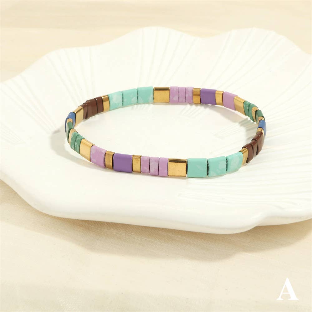 
                  
                    Glass TILA + Hematite Beaded Elastic Bracelets (Collection B)
                  
                