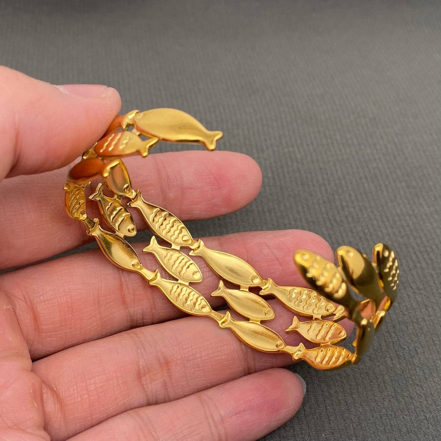 
                  
                    Shoal of Fish Cuff
                  
                