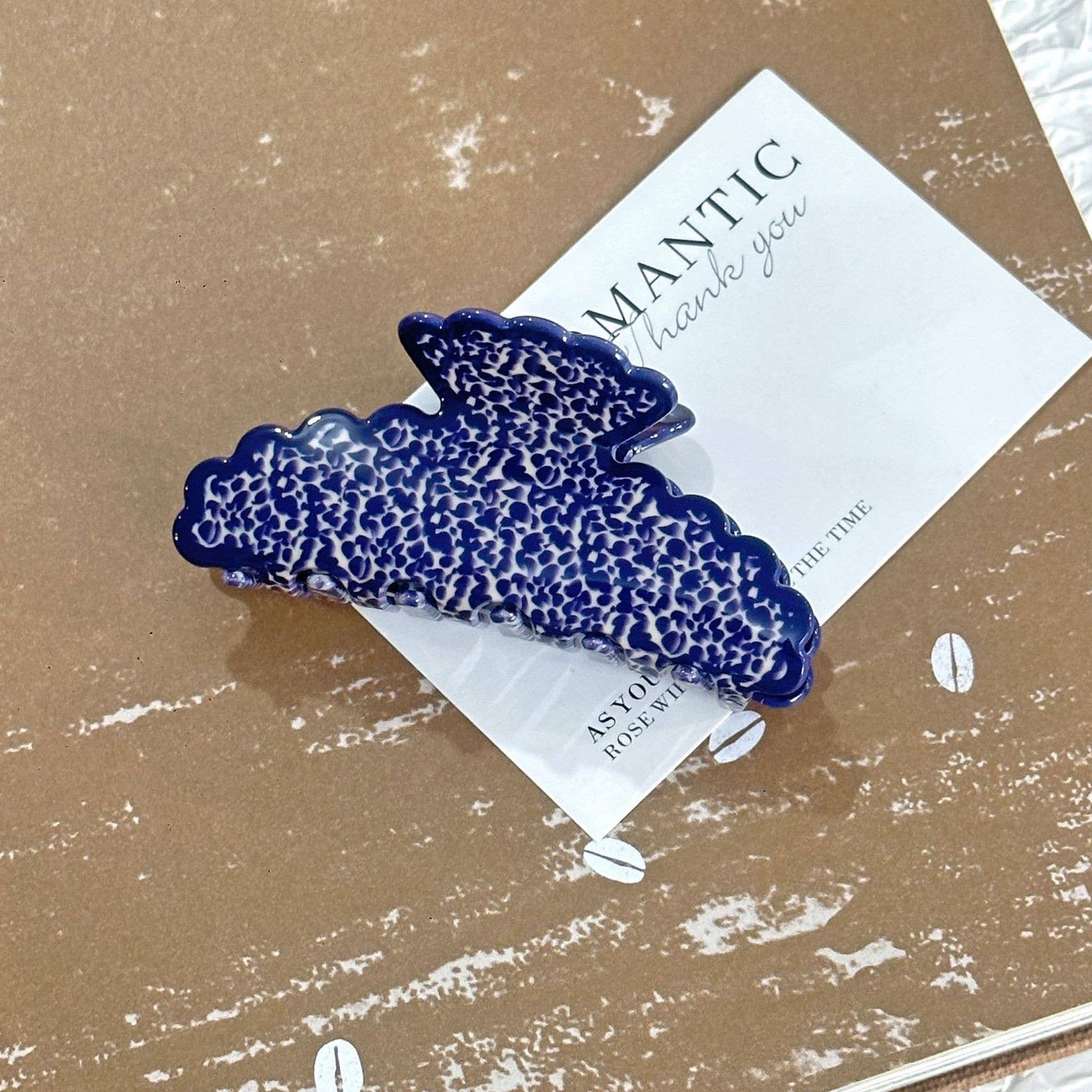 
                  
                    Scalloped Terrazzo Claw
                  
                