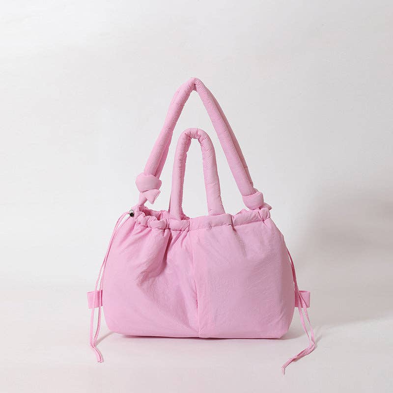 
                  
                    Convertible Large Capacity Nylon Puffer Backpack/Tote
                  
                