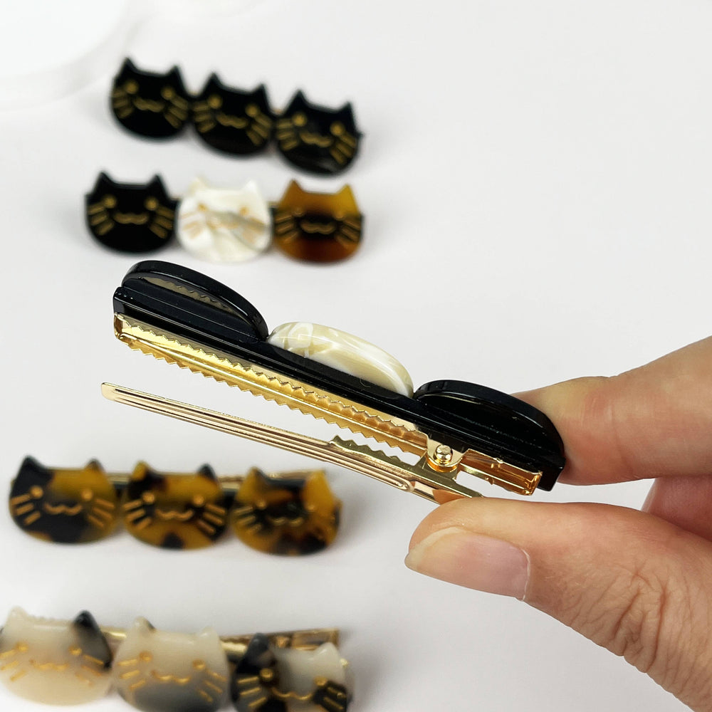 
                  
                    Retro Cats Duckbill Hair Clip
                  
                