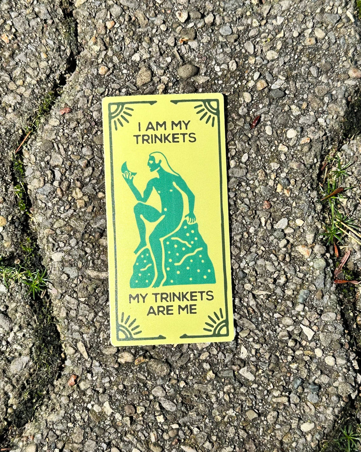 
                  
                    "I Am My Trinkets" Vinyl Sticker
                  
                