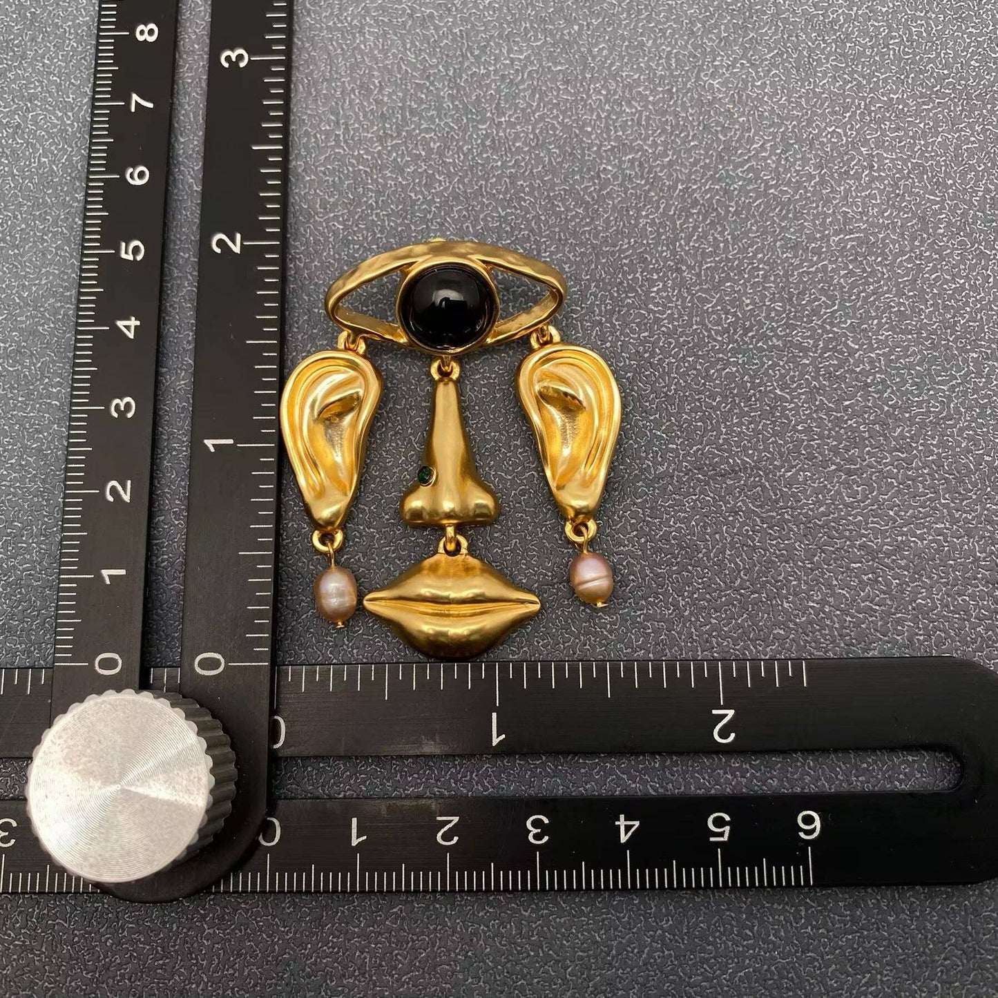 
                  
                    Abstract Face Dangle Earrings
                  
                