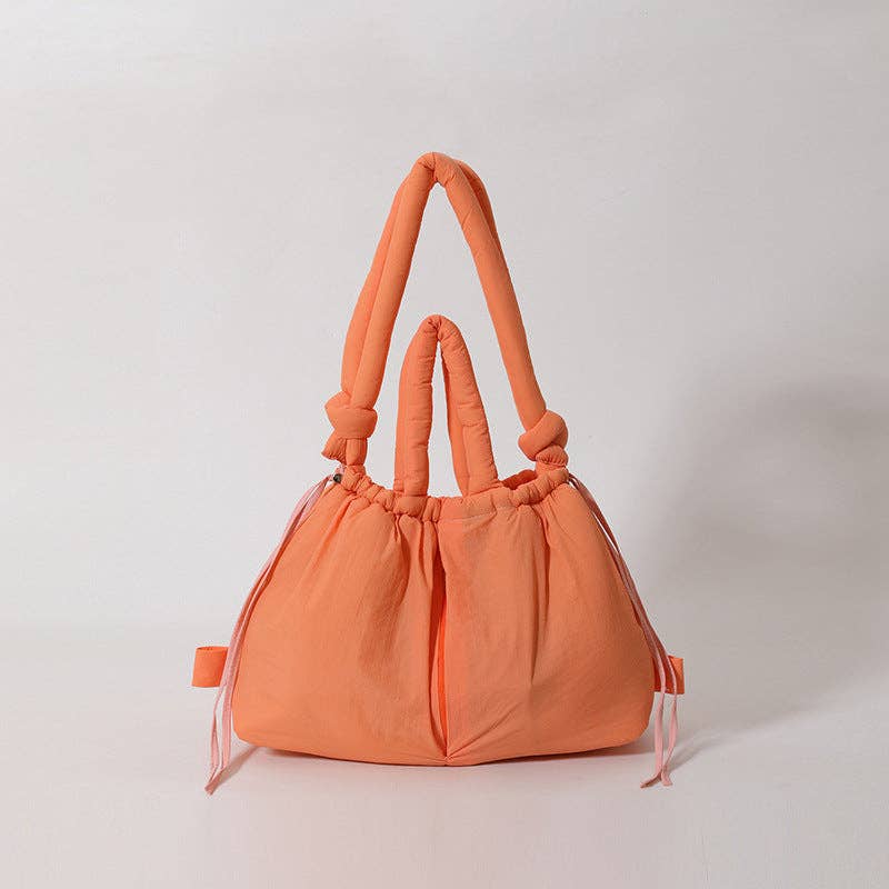 
                  
                    Convertible Large Capacity Nylon Puffer Backpack/Tote
                  
                