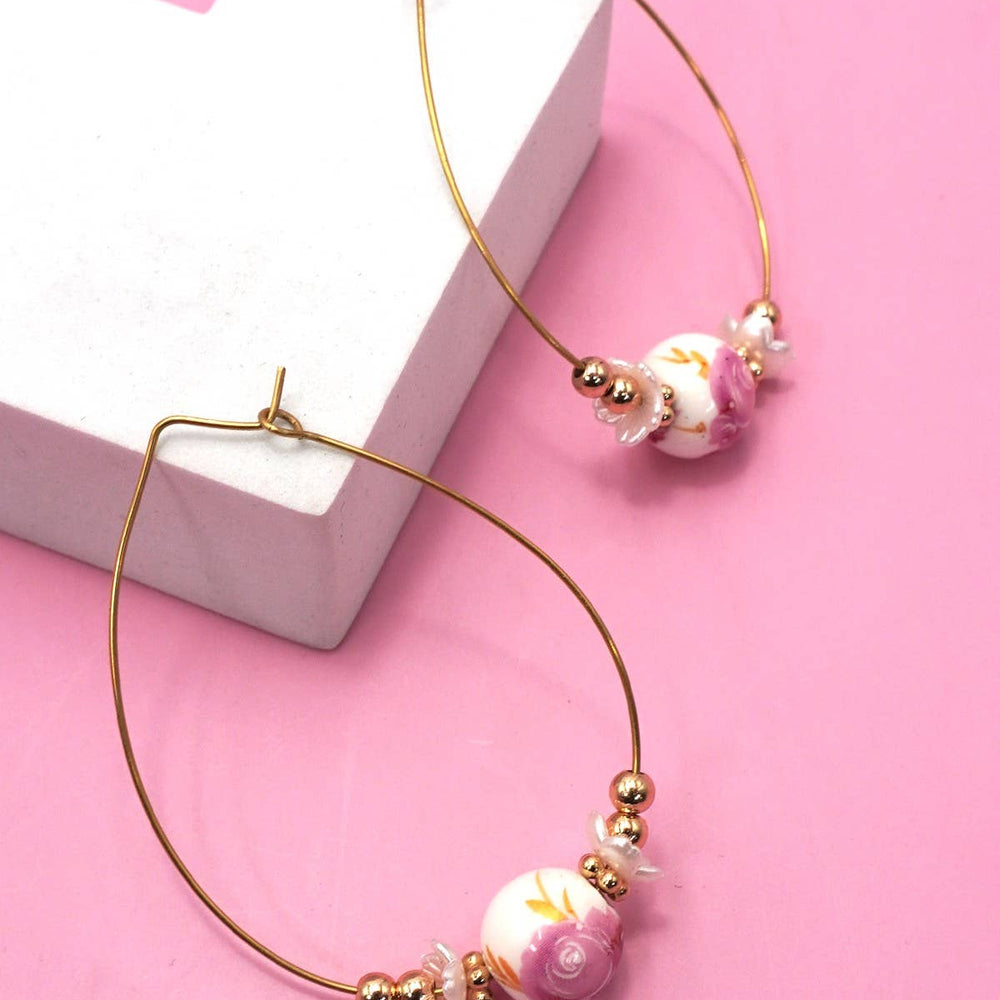 
                  
                    Porcelain Bead Teardrop Earrings
                  
                