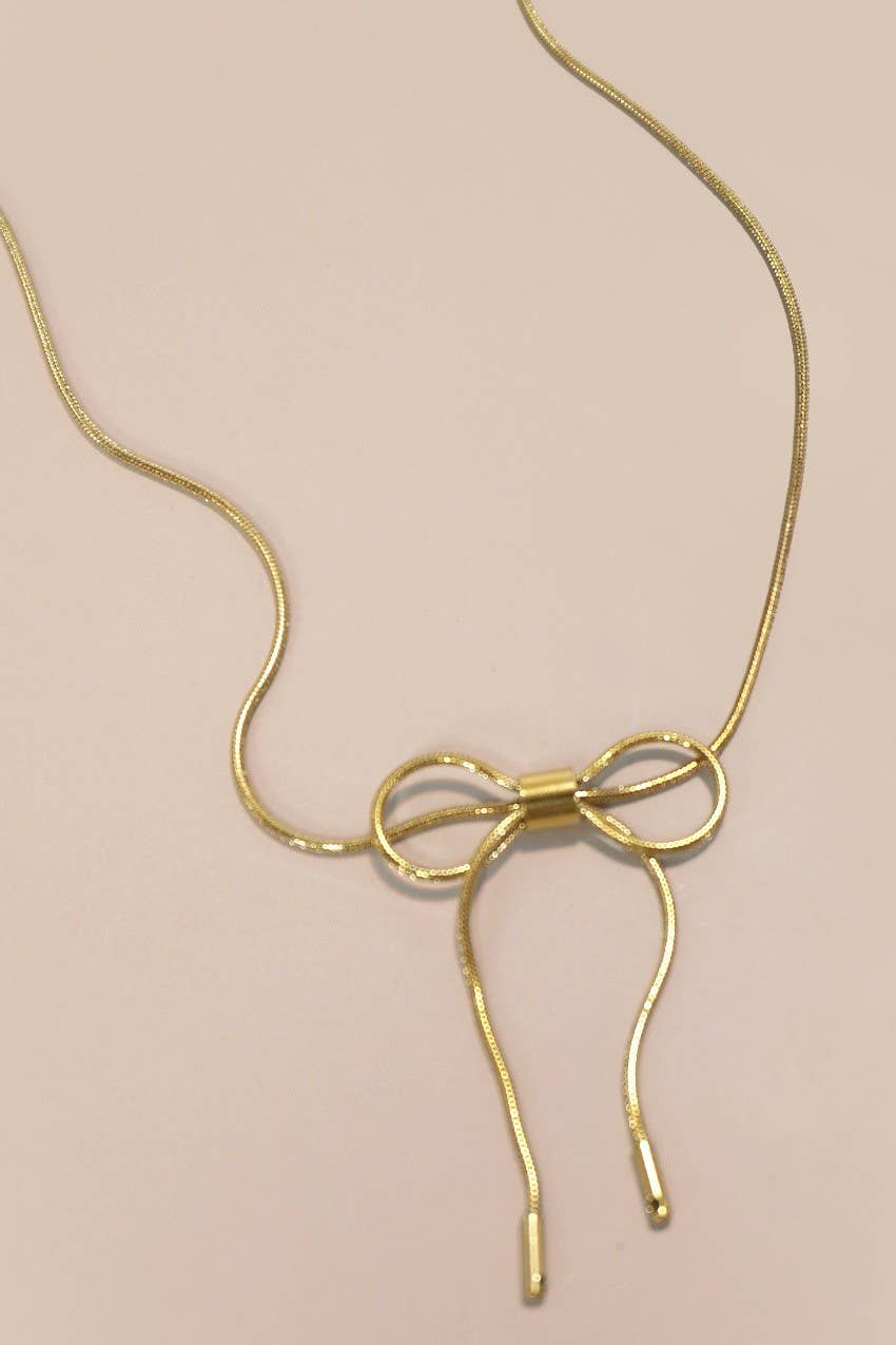 
                  
                    Gold Bow Cable Necklace
                  
                